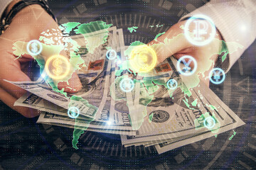 Multi exposure of financial graph drawing hologram and USA dollars bills and man hands. Analysis concept.