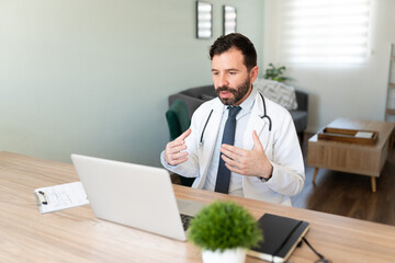 Virtual doctor working from home on a video call