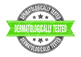 dermatologically tested round stamp with ribbon. label sign