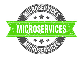 microservices round stamp with ribbon. label sign