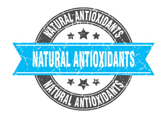 natural antioxidants round stamp with ribbon. label sign