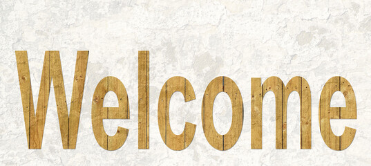 Welcome sign cut out from timber on a abstract background