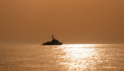 ship sunset on the beach