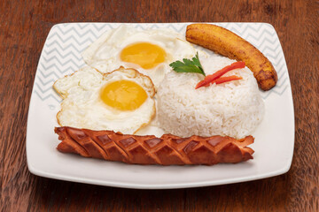 Delicious peruvian food made of rice, meat, egg and banana