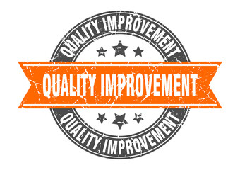 quality improvement round stamp with ribbon. label sign