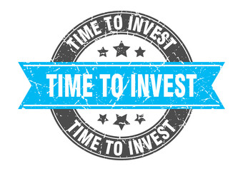 Obraz premium time to invest round stamp with ribbon. label sign