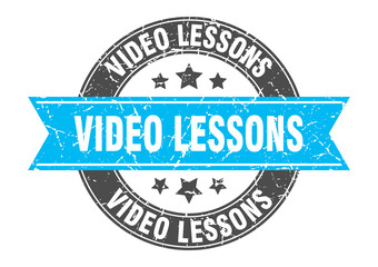 video lessons round stamp with ribbon. label sign