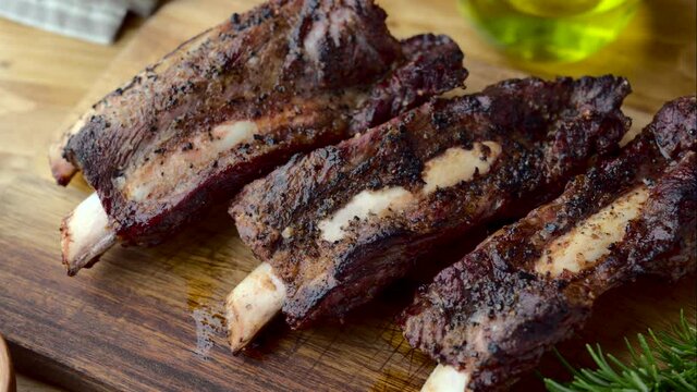 grilled beef back rib on wooden board