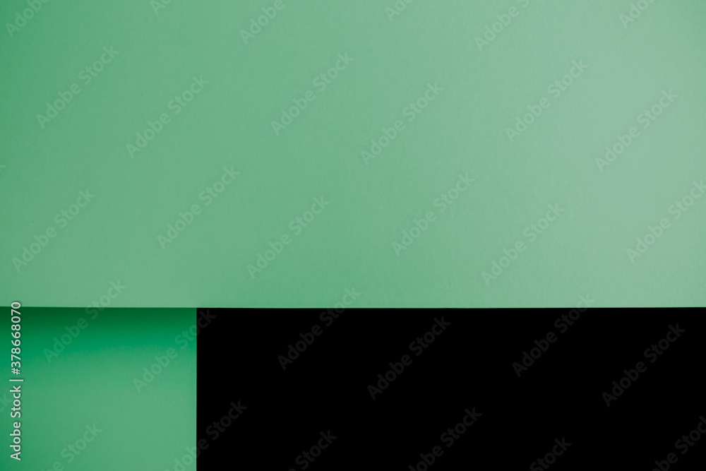 Fototapete Pastel green and black flat lay background with sharp layers and shadows with copy space