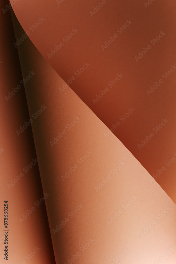 Poster a vertical skin toned flat lay background with sharp layers and shadows with copy space