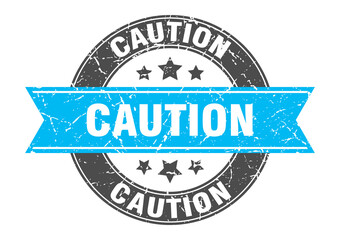 caution round stamp with ribbon. label sign
