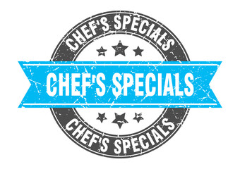 Obraz premium chef's specials round stamp with ribbon. label sign
