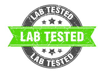 Obraz premium lab tested round stamp with ribbon. label sign