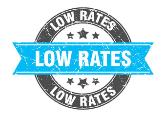 Fototapeta premium low rates round stamp with ribbon. label sign