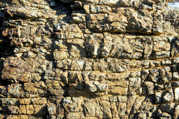 Natural old crumbling stone. Background. Texture.