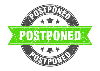 postponed round stamp with ribbon. label sign