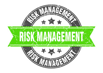 risk management round stamp with ribbon. label sign