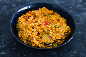 plant-based food, vegan turmeric risotto with mediterranean vegetables