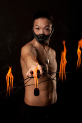 Fototapeta na wymiar asian man with fire show