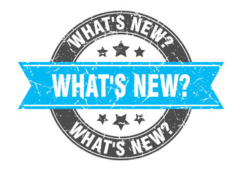 what's new? round stamp with ribbon. label sign