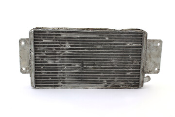 Fototapeta premium Old used car engine radiator on white background