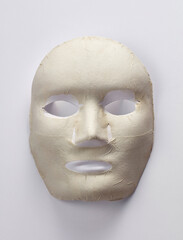 white mask on a white background