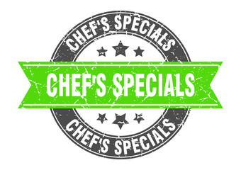 Obraz premium chef's specials round stamp with ribbon. label sign