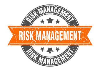 risk management round stamp with ribbon. label sign