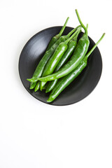 green pepper on white background