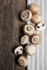 white mushrooms on wooden table