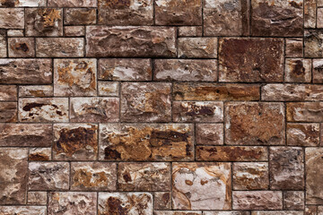 Perfect stone wall. This photo has been altered to make a seamless tessellating image which can be repeated without any visible join.