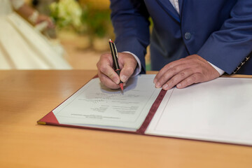 Signature of the groom at wedding day