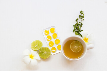 herbal healthy drinks hot honey lemon and lozenge for health care sore throat with lemon slice...