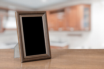 Fototapeta premium photo frame on the wooden table