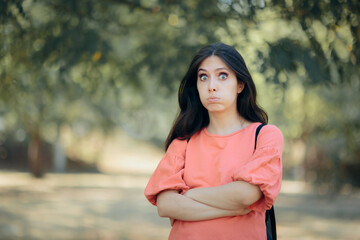 Portrait of a Woman Feeling Puzzled and Thinking