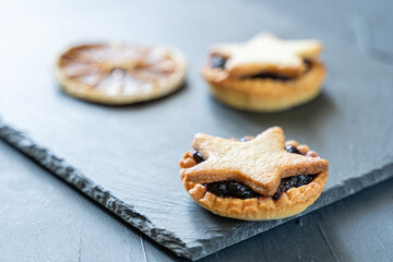 Christmas homemade mince pies on slate plate