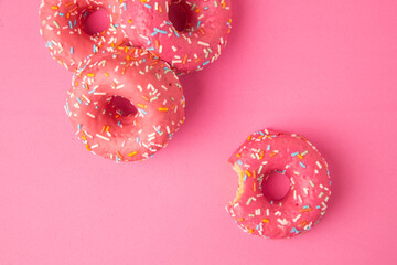 pink donut on pink background