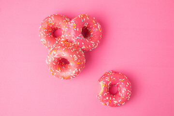 pink donut on pink background