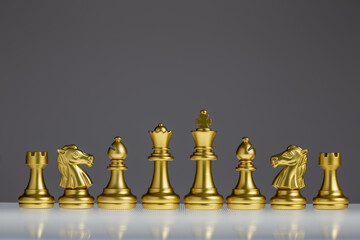 Golden chess set, chess piece icon, King, Queen, Bishop, Horse, Rook, chess game on gray background.