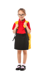 Little schoolgirl on white background