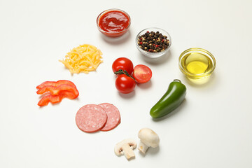 Ingredients for cooking pizza on white background
