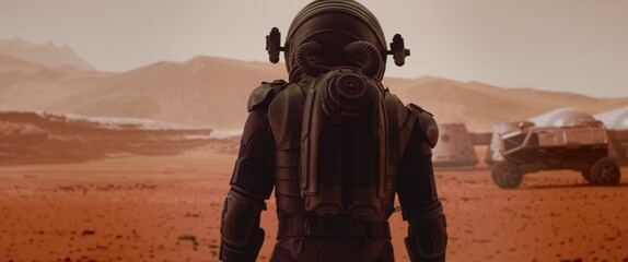 Back view of astronaut wearing space suit walking on a surface of a red planet. Martian base and rover in the background. Mars colonization concept