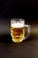 photo mugs of beer on a black background, Oktoberfest