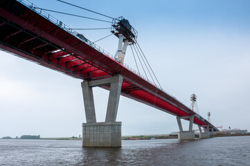 Obraz premium Russia, Blagoveshchensk, July 2019: Bridge on the Amur river from Blagoveshchensk to the Chinese city of Heihe in summer