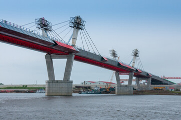 Russia, Blagoveshchensk, July 2019: Bridge on the Amur river from Blagoveshchensk to the Chinese city of Heihe in summer