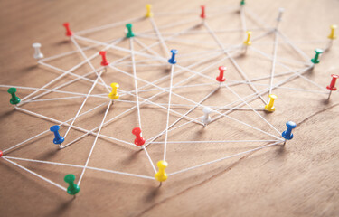 Push pins connected with thread. Network