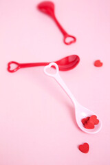 teaspoon and heart shaped candies