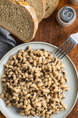 Marinated black eyed beans on plate.