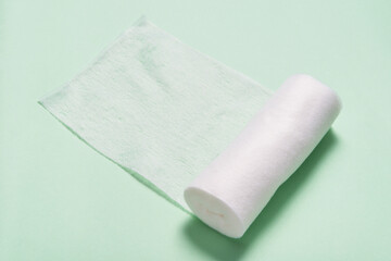 White roll of non woven bandage on  background