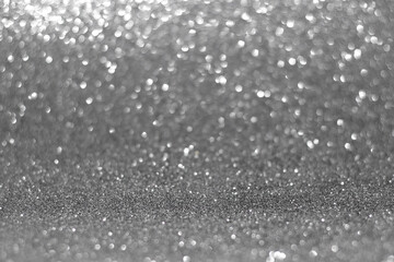 abstract blur white and silver color background with star glittering light for show,promote and advertisee product and content in merry christmas and happy new year season collection concept